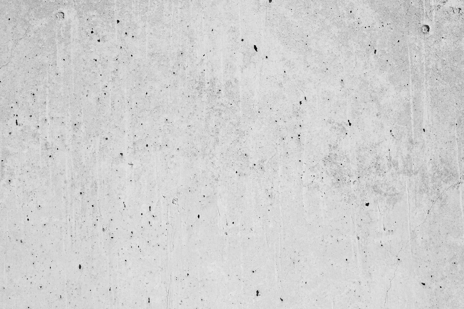 a black and white photo of a concrete wall