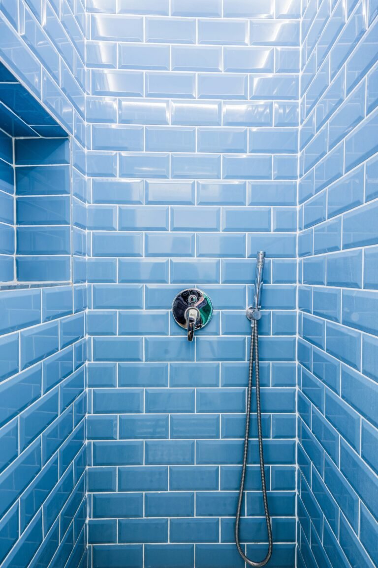Shower Tile vs. Prefab Shower Surround: The 2026 Cost and Longevity Comparison